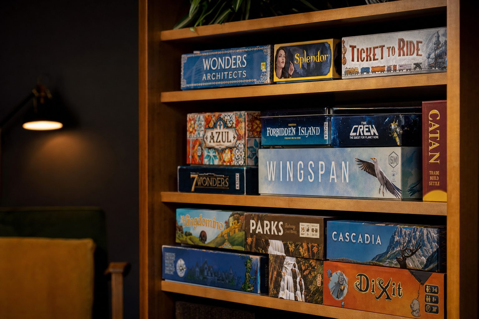 A well-stocked shelf of modern-classic and brand-new family games — the mix that keeps mixed-age game nights running smoothly.